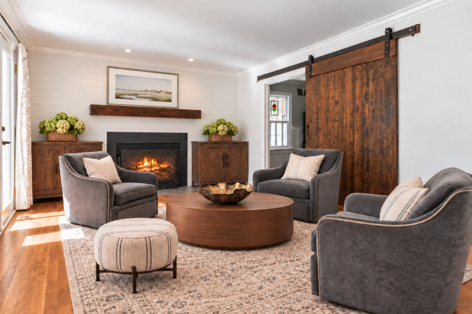 The same living room staged around the owner's own chair